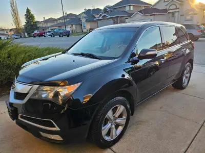 2013 Acura MDX. Brand New All Weather tires, 7 passenger, AWD, V6, Sunroof, Navigation, Heated Seats...