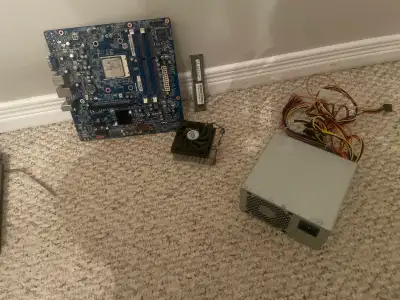  Pc parts bundle - motherboard with CPU attached, 4GB ram, PSU, View more