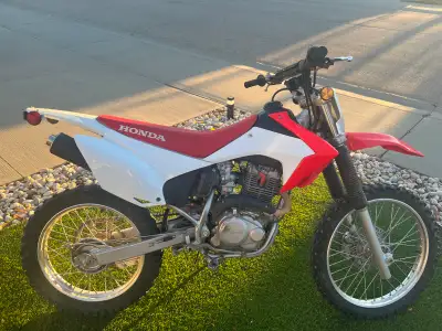 Well taken care of Honda crf230f. Excellent trail bike, delivers power and stability with Honda’s re...