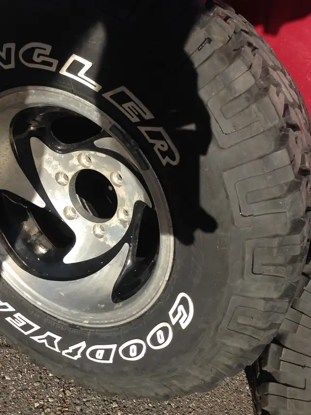 four studded 235 x 75 x r15 on 4  american eagle rims in Tires & Rims in Vernon - Image 5