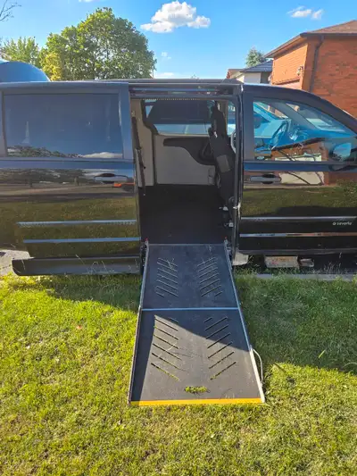 Description: 2017 Dodge Grand Caravan with manual Savaria side-entry wheelchair ramp – reliable, fun...