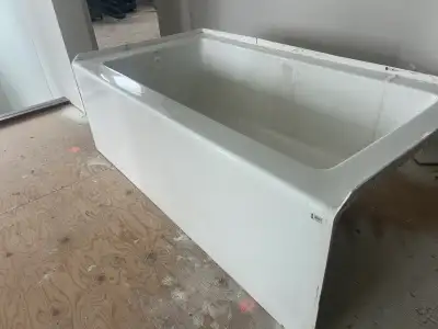 Previously installed white high quality very good condition acrylic bathtub with apron . 60” x 32” N...