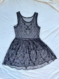 Free People mesh black intricately beaded dress. Size small.
