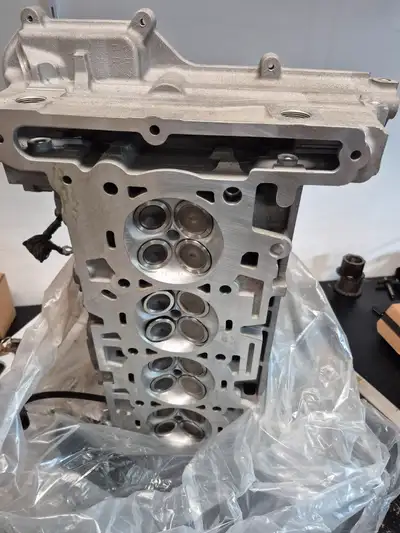 Rebuilt cylinder head from 2008-2012 GM 2.9 LLV Engine , head has new rockers , lifters , valves etc...