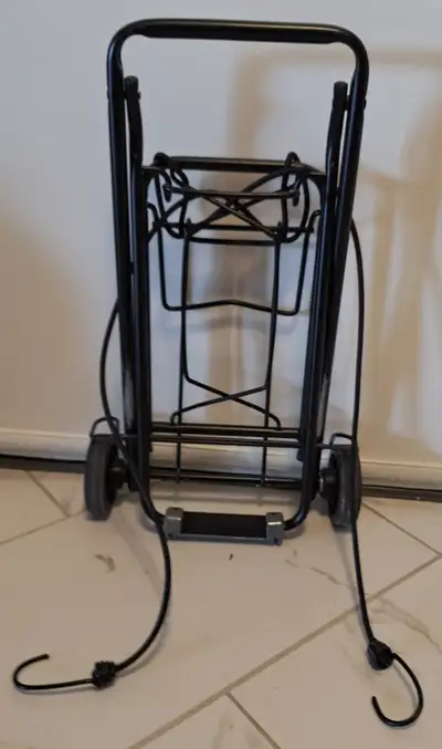 This sturdy, folding luggage cart is in good condition and perfect for moving heavy boxes, suitcases...
