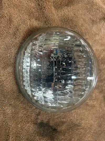 I am selling a new Harley passing lamp, part number 4449, that delivers a bright and focused beam fo...