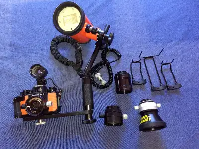 Nikonos V 35mm underwater film camera. With Nikonos 105 strobe, mounting-handle system, 35mm lens, 2...
