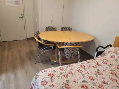 Solid wood kitchen/dining room table and chairs, View more