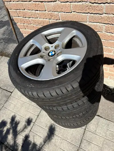 I'm selling a set of four used OEM BMW rims with tires, size 225/50ZR17 98W M+S, bought them brand n...