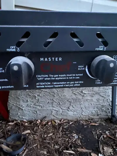 Master Chef Outdoor Grill Propane powered (tank not included). Grill works but has some rust. Cover...
