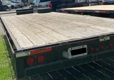 2021 8'x18' Tandem Axle Trailer. Steel frame with wooden deck. Built by Highland Metal Fabricating I...