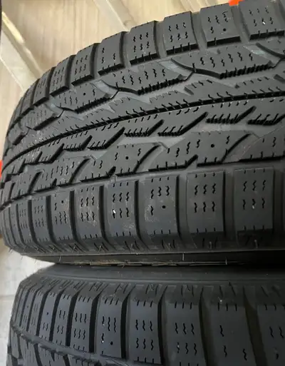 Winter tires WITH rims Used on 2017 Nissan Rogue for 2 seasons or about 8,000 kms Firestone Winterfo...