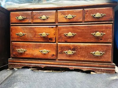 Vintage chest of drawers / dresser. Made of solid wood. Measures 50 inch by 17 inch, and 30 inches h...