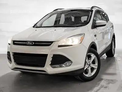 This 2014 Ford Escape EcoBoost is a compact SUV that offers a blend of efficiency and performance, p...