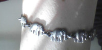 Cute Metal Elephant bracelet with lobster clasp.