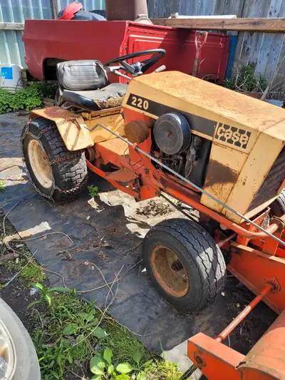 Case 220 Hydraulic drive Tractor. Runs Well. With PTO. Comes with: - lawn mower deck - roto tiller -...
