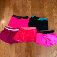 Size 7-8 4 shorts and 1 skirt with built in shorts