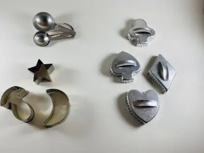 Lot of vintage Cookie Cutters and measuring spoons (used), View more