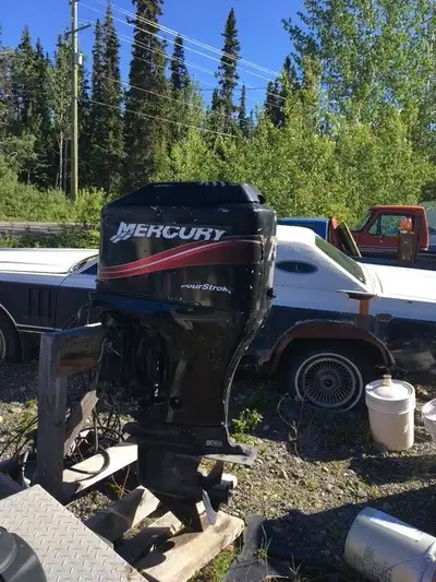75 horse Mercury four stroke outboard with controls , ran good but has been stored for some years, n...