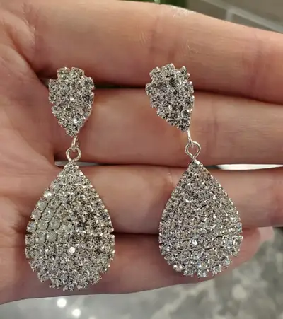 Drop Earrings (David’s Bridal) - $20 Bracelet - $15 Long Silver Earrings - $10 Rose Gold Flower Drop...