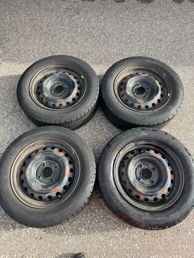I'm offering a set of four Goodyear Advantage T/A tires, size 205/60R15 91H, mounted on steel rims....