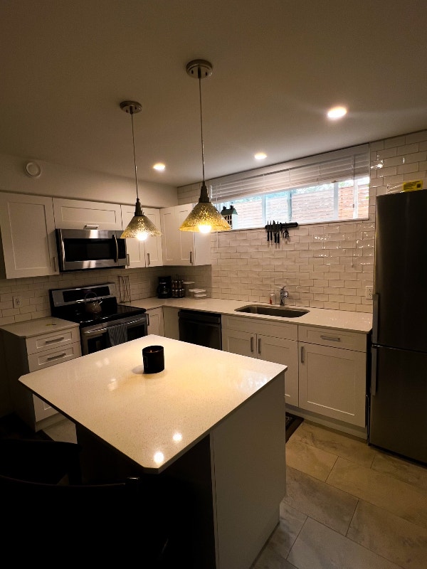 FULLY FURNISHED PRIVATE ONE BEDROOM BASEMENT SUITE Long Term Rentals