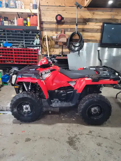 vtt Polaris 570 avec coffre arrière et winch très peu servi , chasse