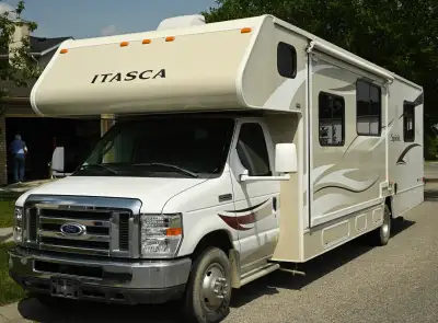 Ford F450 cab and chassis, Winnebago coach. Great condition. Onan generator, heated tanks, one owner...