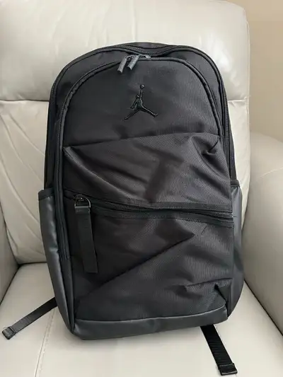 brand new original with tags colour black multiple pockets very spacious size large from smoke and p...