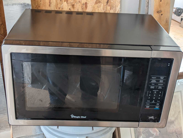 Stainless/black microwave in Microwaves & Cookers in Kingston