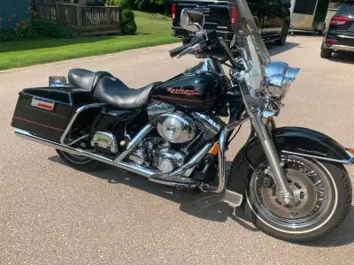 This is a 1999 Harley Davidson Road King just had it's 50,000 kilometer service done lots of kilomet...