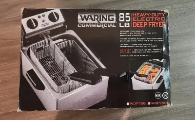 Heavy-duty compact electric deep fryer. Commercial grade. Includes twin baskets and a stainless stee...