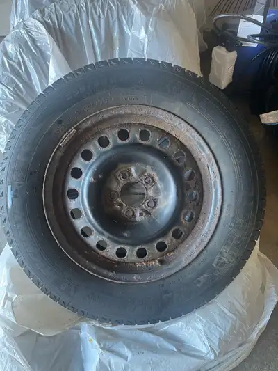 Selling a complete set of 4 Michelin tires mounted on heavy-duty steel rims. They were previously us...