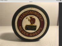 Lloydminster  Never Sweats hockey puck from the 1980’s