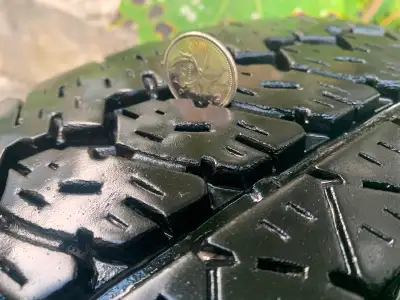 Four excellent condition Bridgestone all terrain tires off rim with very good tread left. Made in Ca...