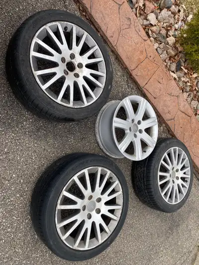 These are a set of 4 used Audi rims sized for 225/45/R17 3 that are on3 tires and one no rim $90 or...