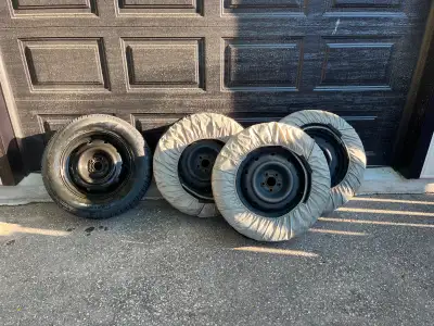 Off-Season DEAL!! 215/65 R16 Snow tires on steel rims.