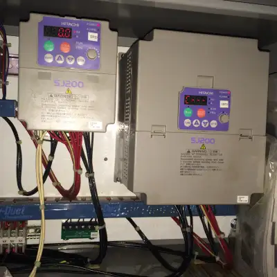 Experienced industrial electrician troubleshooting motors, VFDs, and low- and high-voltage systems a...