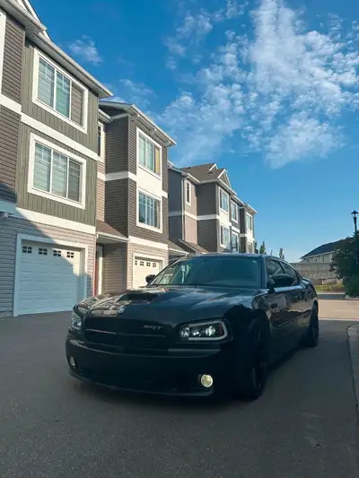 For sale is my 2006 Dodge Charger SRT 8. It’s got Hellcat Rims and a 6.1L V8. Features headers with...