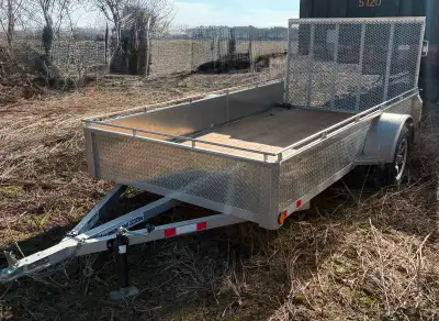 2023 6x12 aluminum trailer bought brand new Mesh gate 4 Retractable ratchet straps bolted on that ca...
