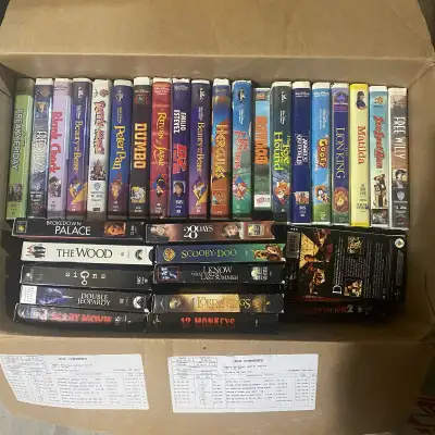 Approx 80 tapes total, all inside the box. Great titles. Pick up in Morningside SW Airdrie or Inglew...