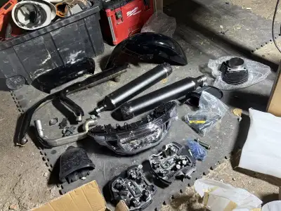 Bunch of parts from heads pistons exhaust carb intake all new message if interested