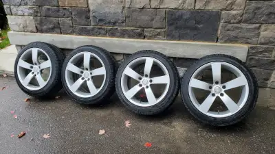 A good set of winter tires on nice 5-spoke alloy wheels. Common 205/50 R17 size is equivalent to 225...