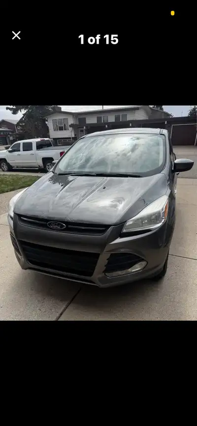 2014 Ford Escape 4 WD 4 door SE. Ford Escape SE is a compact SUV with space , comfort, and capabilit...