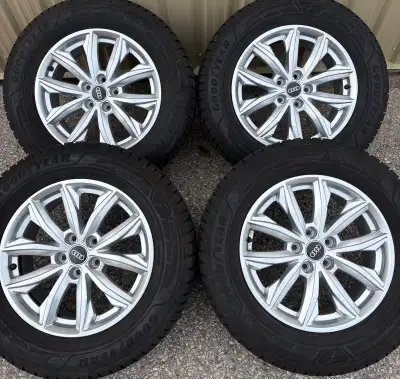 EXCELLENT CONDITION 4 x 235/65/17 GOODYEAR ULTRAGRIP WINTER TIRES MADE IN GERMANY AND OEM AUDI RIMS...