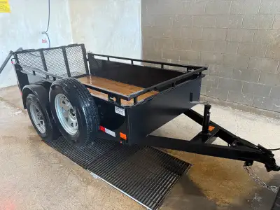 Excellent condition, heavy duty 3500lb axle utility trailer. Bought new at a dealership last summer....