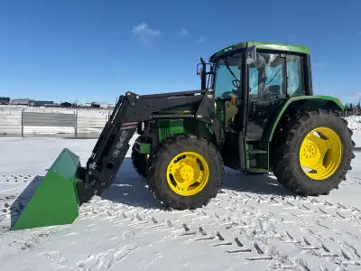 JOHNDEER. Tractor Model 6100 Front end loader with 84 inches bucket with one joystick control A/C. H...