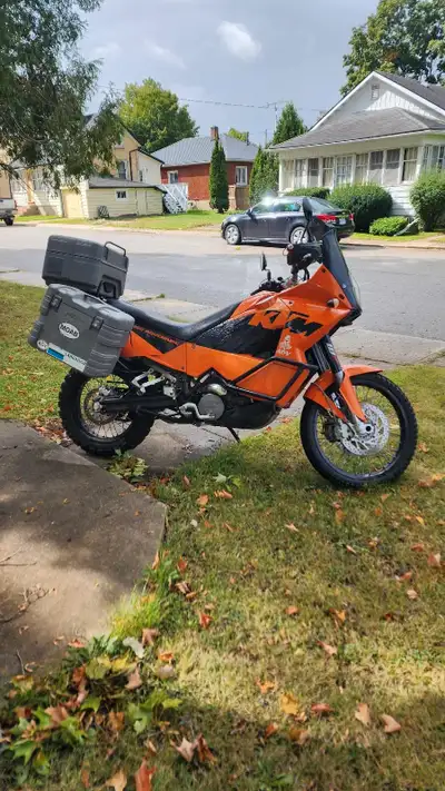 I'm selling my 2006 KTM 950 Adventure, an orange beast ready for any terrain! This used adventure bi...