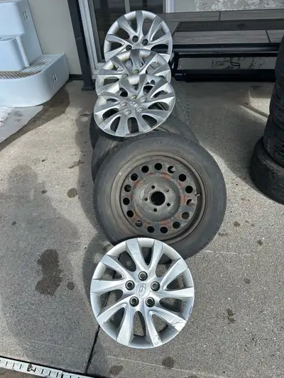 Light surface rust 16” rims with Elantra wheel covers. Bolt pattern 5-114.3 fits many makes. Check w...