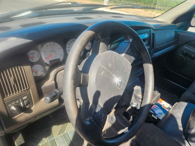 **Dodge Ram 2500 5.9 diesel 4x4 long box crew cab topper in Cars & Trucks in St. Catharines - Image 3